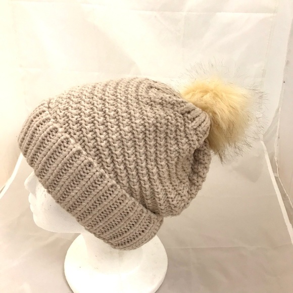 hat with puff on top